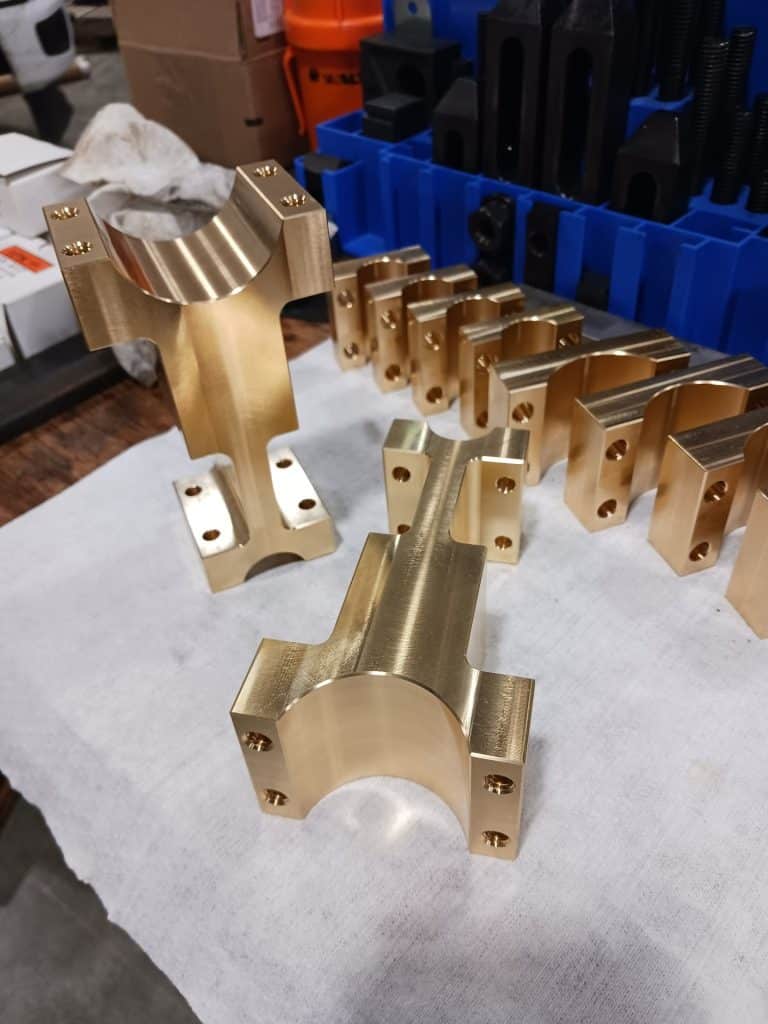 CNC machined bronze components produced by Inland Mechanical, Richland WA