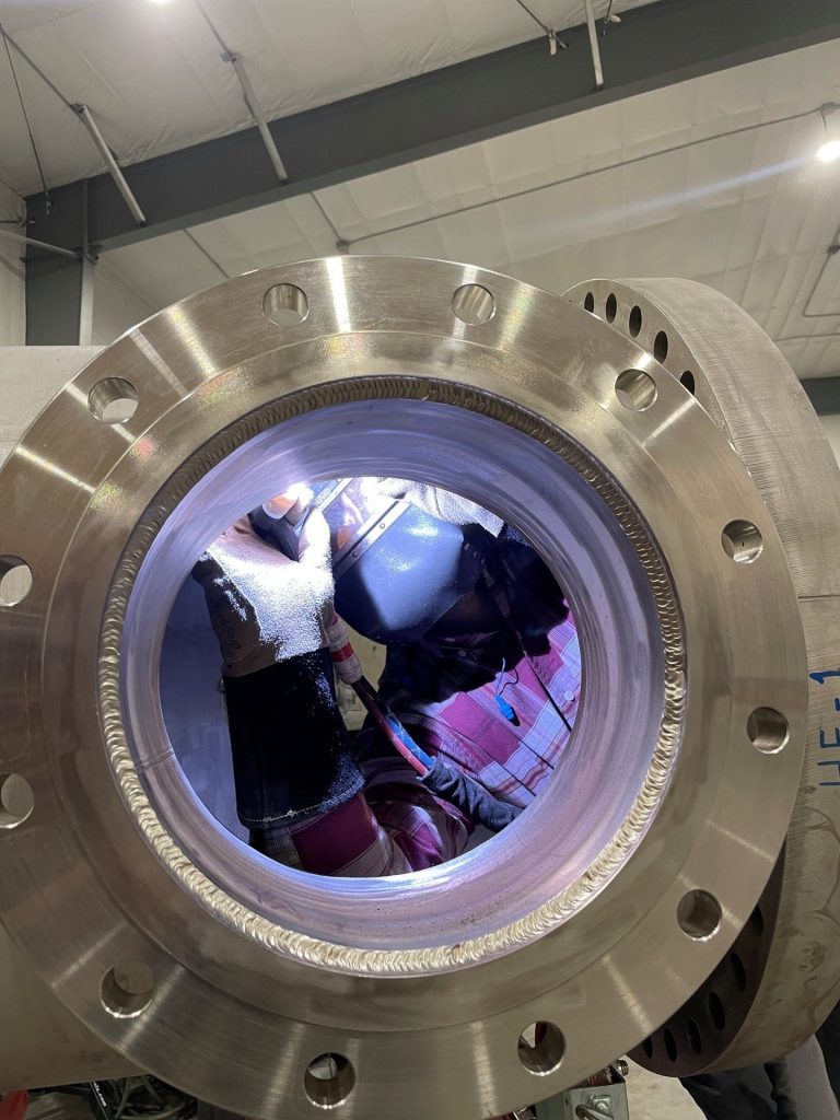 Stainless steel welding inside a code vessel at Inland Mechanical, Richland WA
